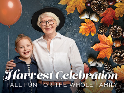 Smiling older woman and young girl holding a balloon, standing beside autumn leaves and pinecones. Text reads: “Harvest Celebration. Fall fun for the whole family.”.