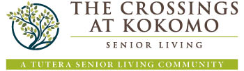 crossings-at-kokomo-logo-color Logo for The Crossings at Kokomo Senior Living featuring a blue and green tree illustration, with the tagline “A Tutera Senior Living Community” in a green banner below the main text.