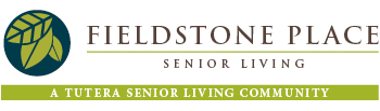 fieldstone-place-logo-color Logo with a leafy green circle on the left, next to the words “Fieldstone Place Senior Living” above a green bar that reads “A Tutera Senior Living Community.”.