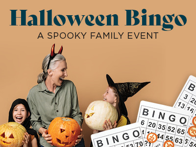 Three people in costumes hold carved pumpkins, smiling at each other. Bingo cards are in the foreground. Text reads: “Halloween Bingo: A Spooky Family Event.”.