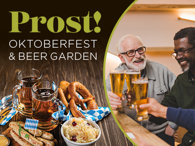 Two men clink beer glasses at a bar. Inset: traditional Oktoberfest food like pretzels, sausages, and sauerkraut with blue and white checkered flags. Text reads “Prost! Oktoberfest & Beer Garden.”.