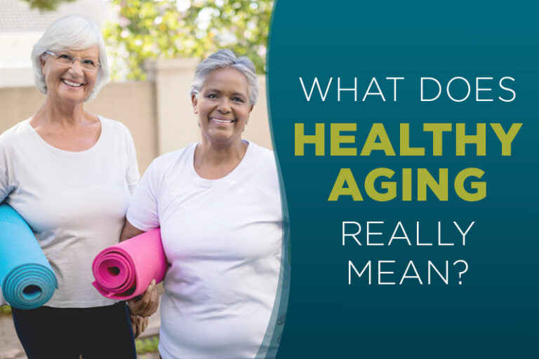 Two older women smiling and holding yoga mats outdoors, next to text that reads, โWhat does healthy aging really mean?โ with a green and blue background.